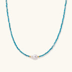 Apatite pearl beaded necklace with faceted teal apatite beads, freshwater pearl center and 18K gold vermeil accents by VAHN Jewels