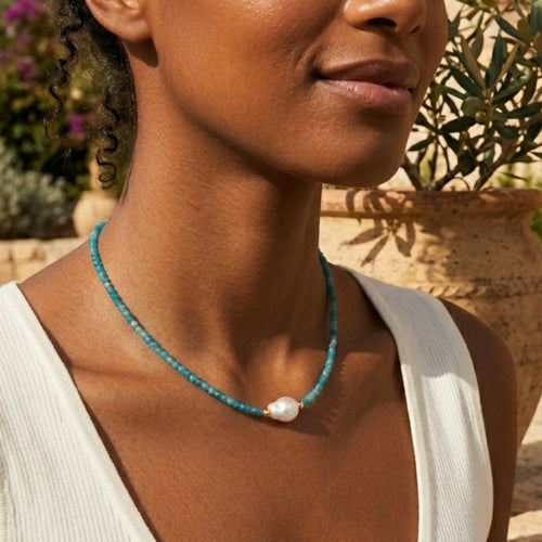 Woman wearing teal apatite pearl beaded necklace outdoors by VAHN Jewels
