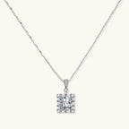 Art Deco moissanite pendant necklace in 925 sterling silver with 3ct VVS1 cushion-cut moissanite and baguette halo by VAHN Jewels