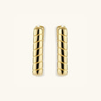 Side view of rectangular gold bamboo segment hoops in 18K gold-plated silver