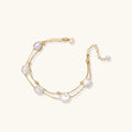 Gold vermeil pearl bracelet on double 18K vermeil chains with baroque pearls, front view | VAHN Jewels