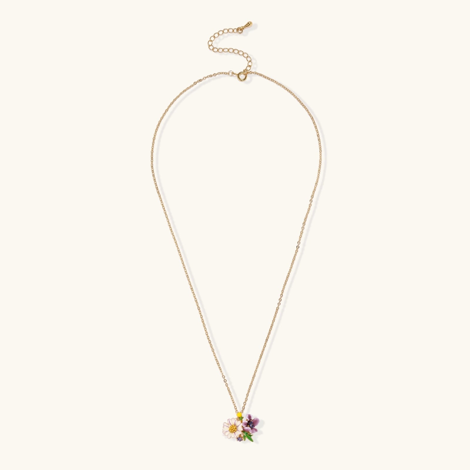  Close-up of hand-painted enamel bouquet pendant with pink, lilac and cream flowers in 18K gold