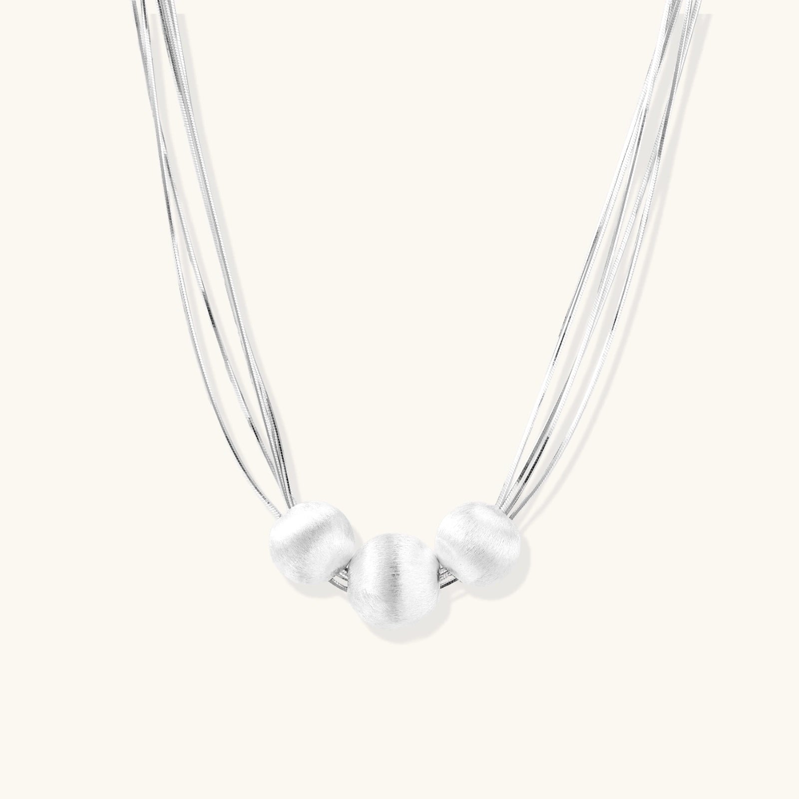 Brushed silver multi-strand necklace in 925 sterling silver with three sculptural brushed beads by VAHN Jewels
