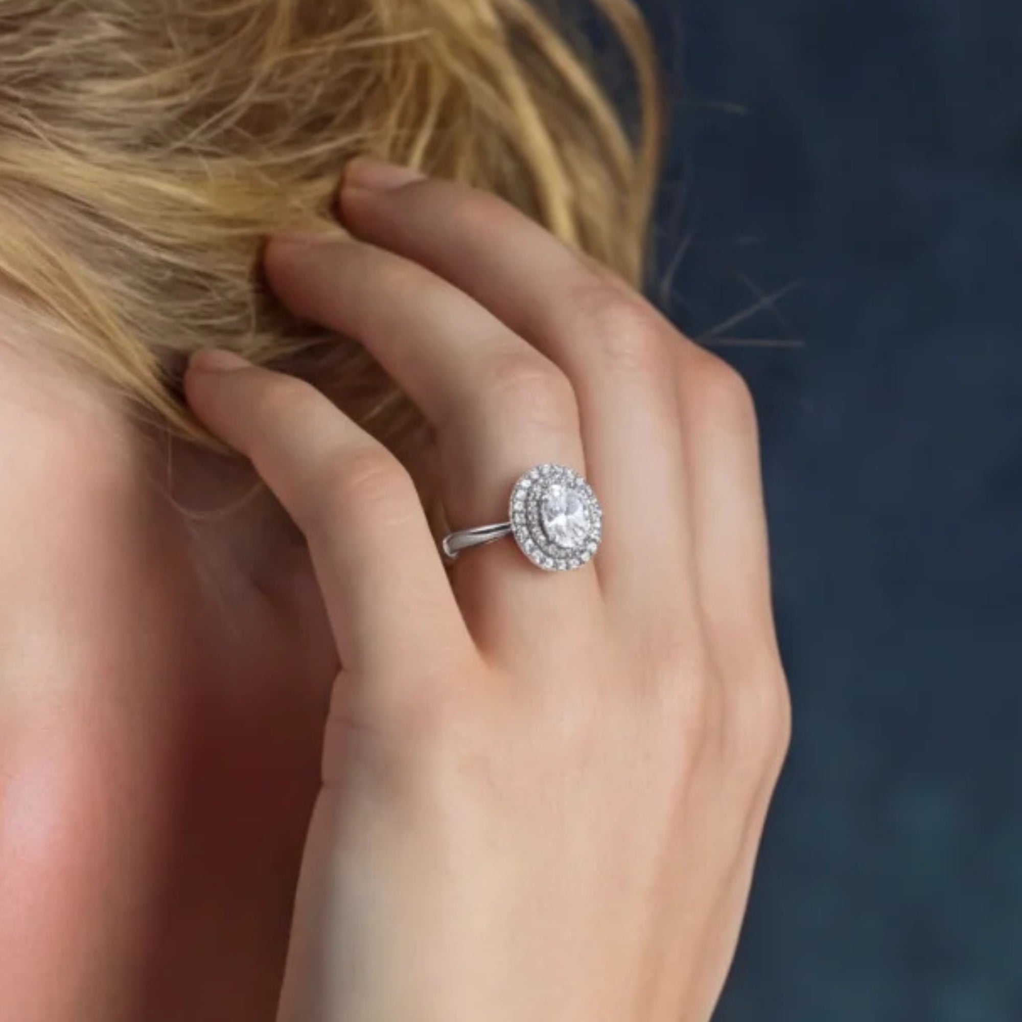 Woman wearing double halo moissanite promise ring in silver | VAHN Jewels