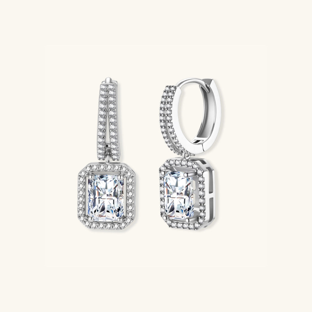 Angled view of emerald cut moissanite drop earrings in 925 silver showing double pave row and stone depth by VAHN Jewels