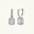 Angled view of emerald cut moissanite drop earrings in 925 silver showing double pave row and stone depth by VAHN Jewels