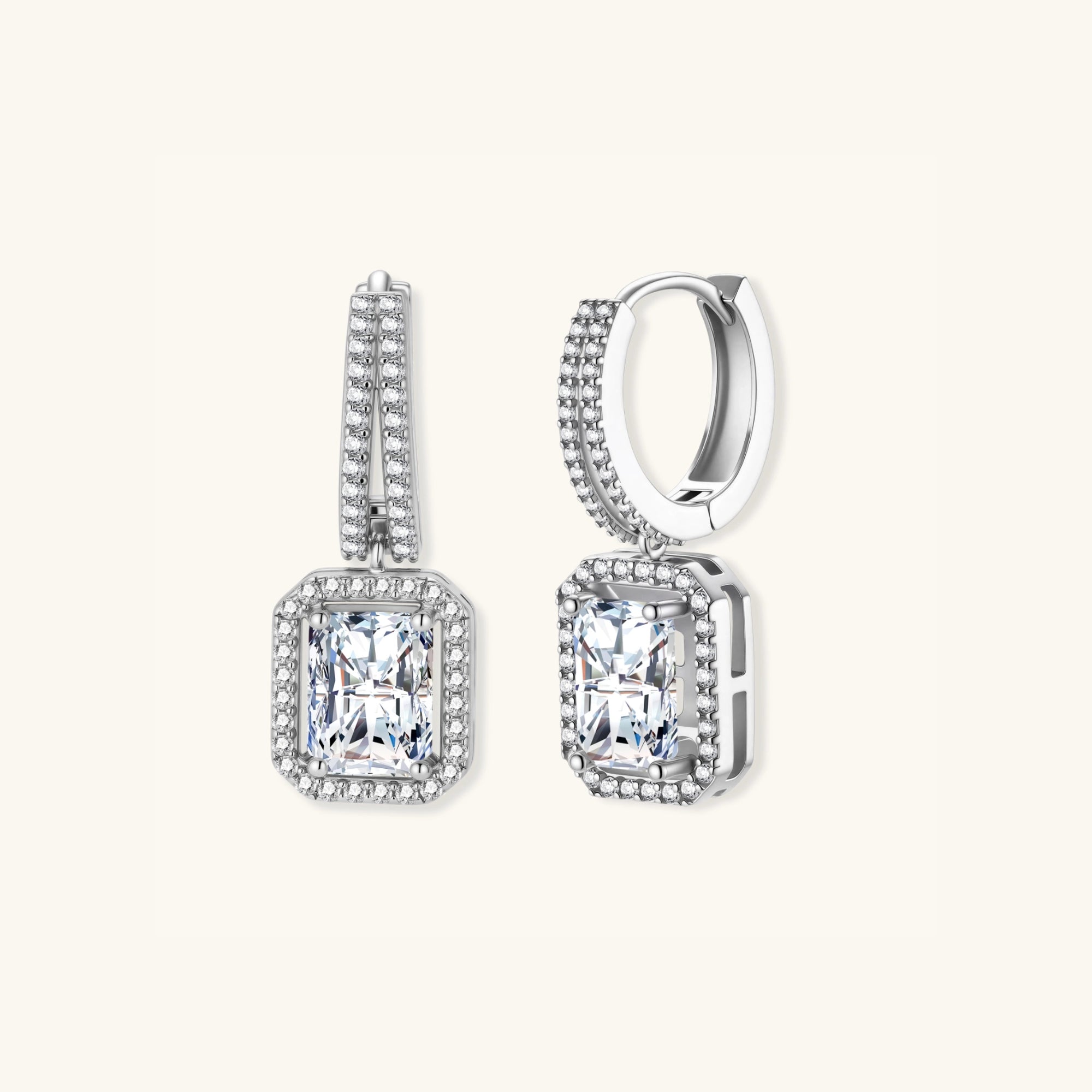 Angled view of emerald cut moissanite drop earrings in 925 silver showing double pave row and stone depth by VAHN Jewels