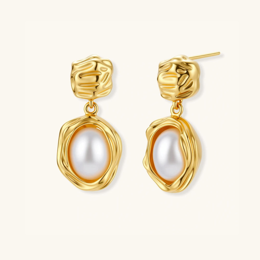 Pair view of golden bloom pearl drop earrings showing textured gold stud and pearl drop by VAHN Jewels