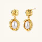 Pair view of golden bloom pearl drop earrings showing textured gold stud and pearl drop by VAHN Jewels