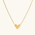 Golden heart pendant necklace in 18K gold-plated 925 sterling silver with brushed sculpted heart by VAHN Jewels