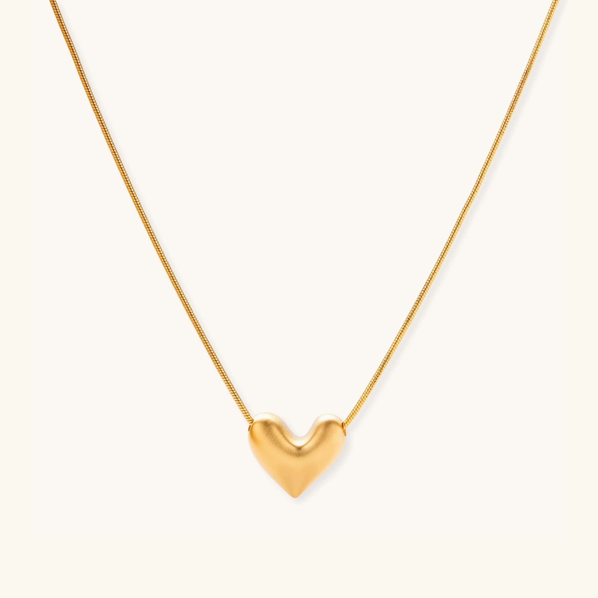 Golden heart pendant necklace in 18K gold-plated 925 sterling silver with brushed sculpted heart by VAHN Jewels