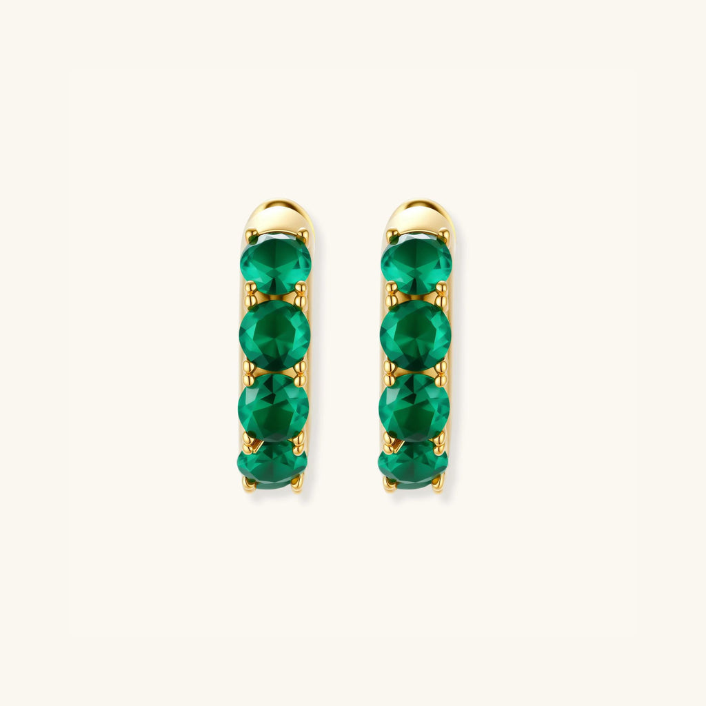 Green pave gold huggie hoop earrings in 18K gold-plated 925 sterling silver with emerald-green zirconia by VAHN Jewels