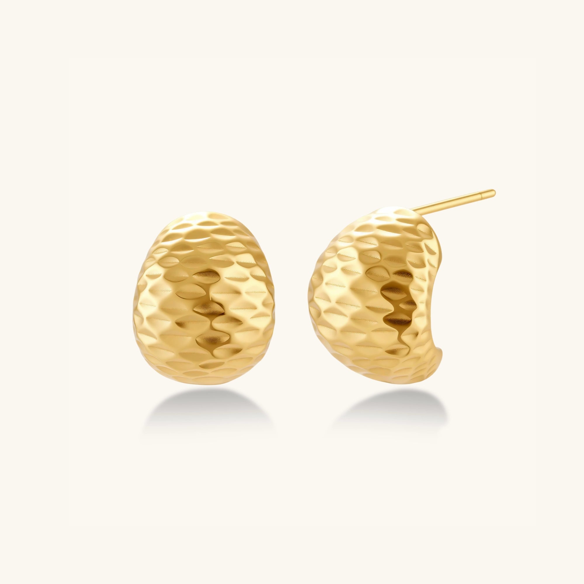 Close-up pair of hammered gold huggie earrings showing faceted texture in 18K gold-plated 925 silver by VAHN Jewels