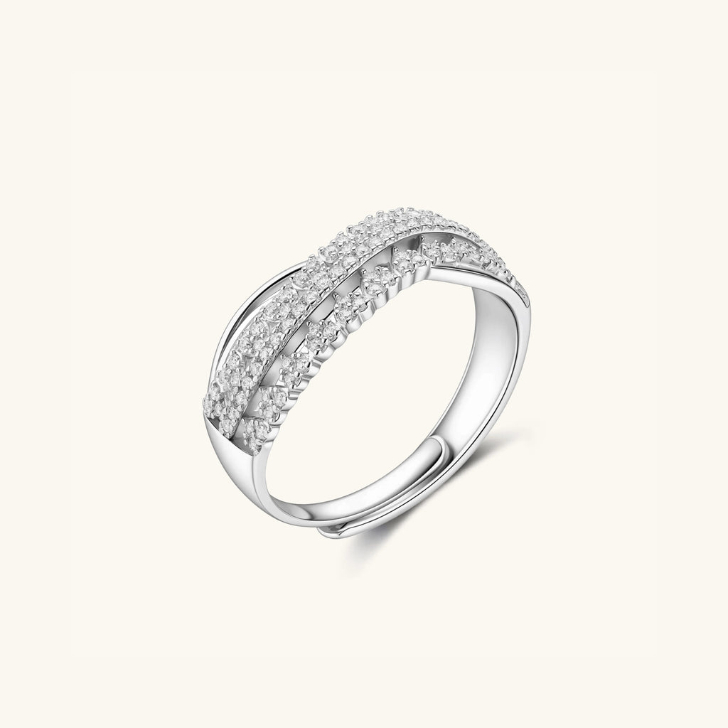 Side view of infinity crossover ring showing twisted pave bands in 925 sterling silver