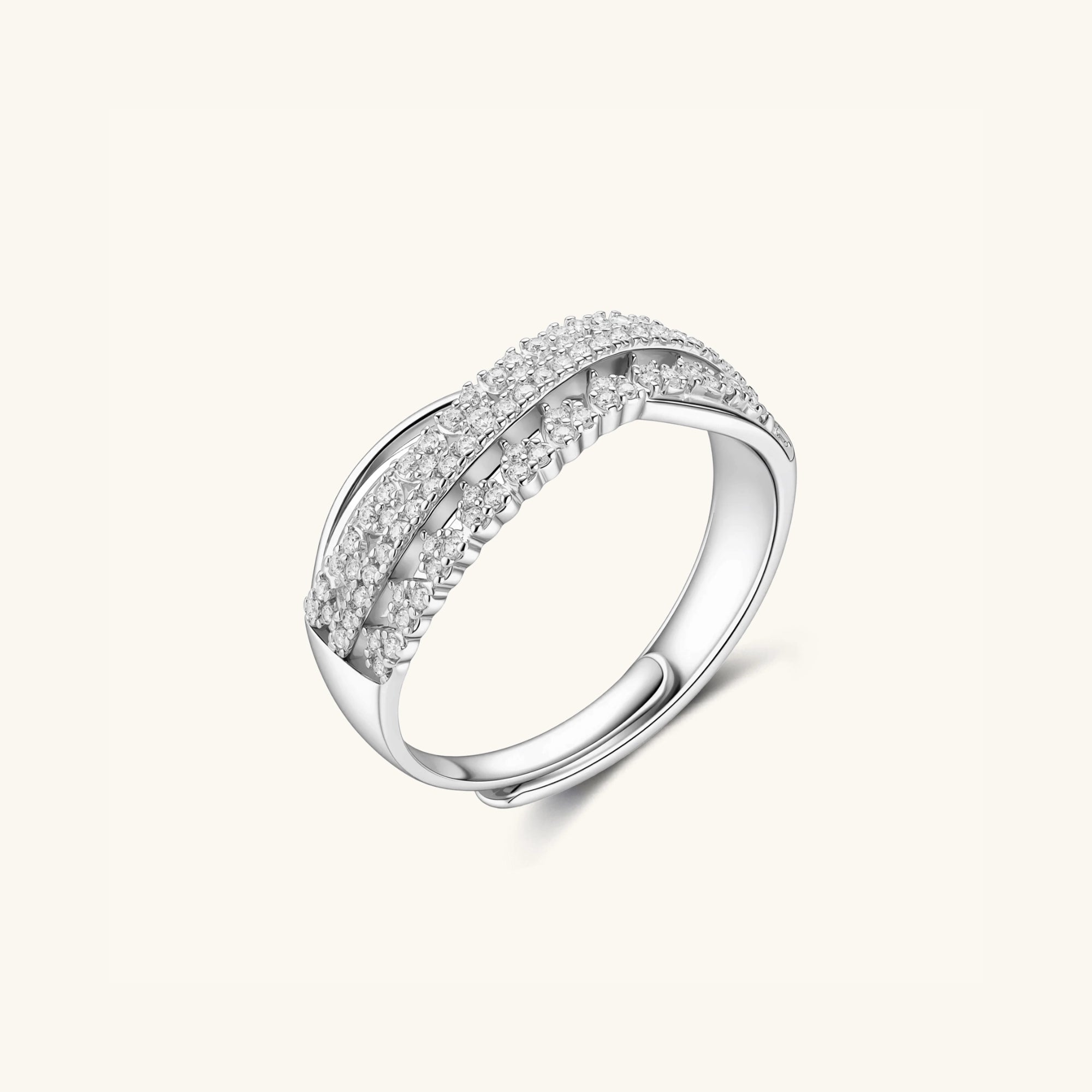 Side view of infinity crossover ring showing twisted pave bands in 925 sterling silver