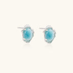 Pair of larimar stud earrings with organic silver setting in 925 sterling silver
