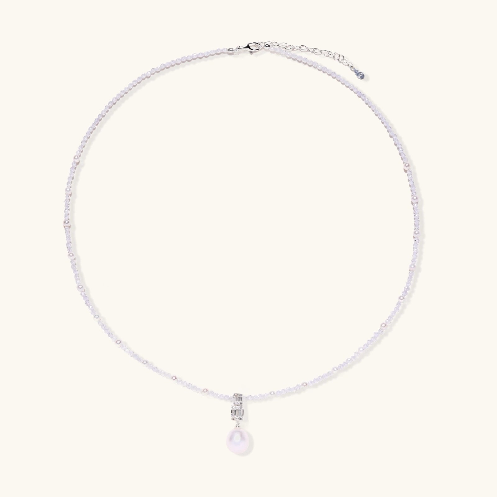 Rhodium silver lavender pearl necklace close up with geometric crystal pendant