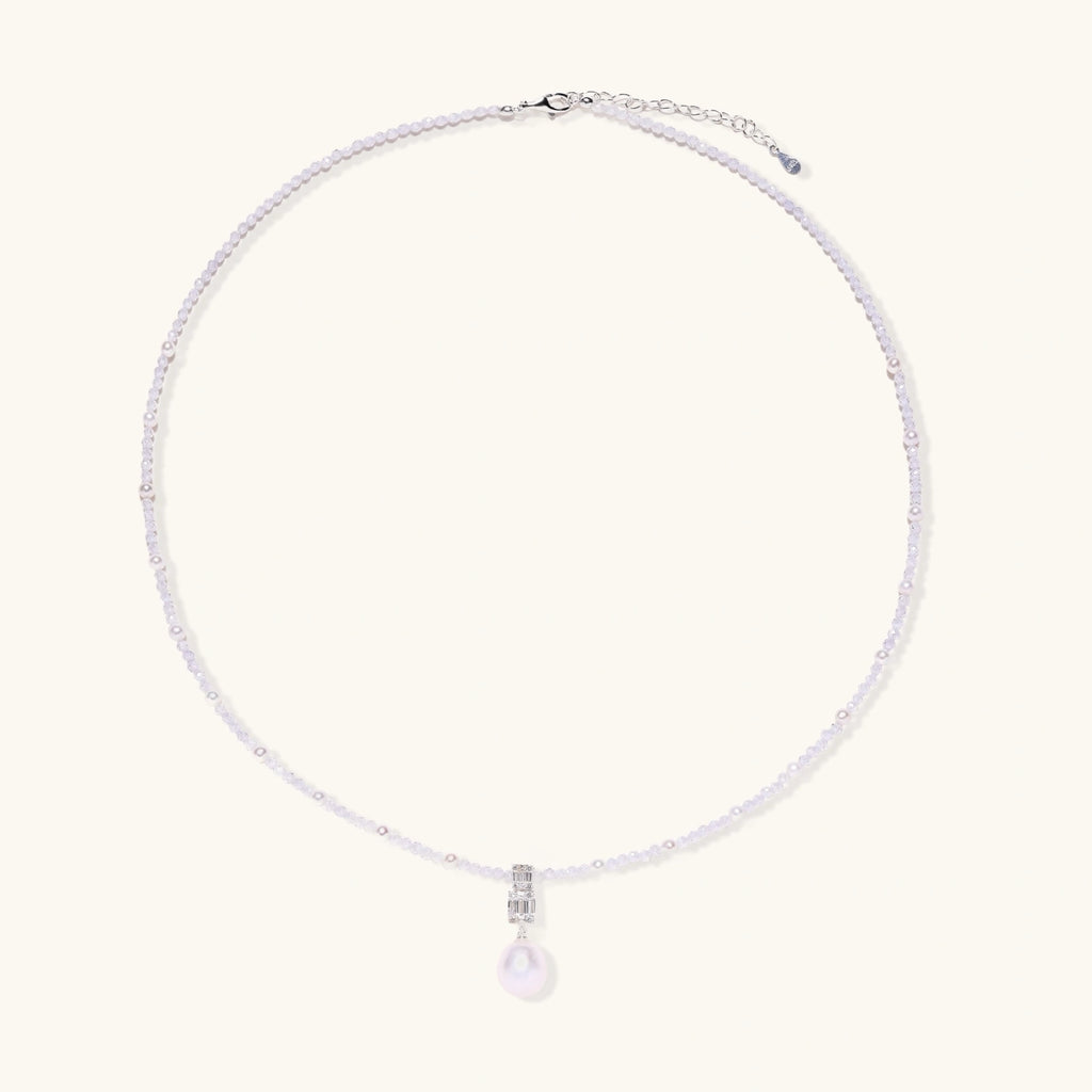 Circle view of lavender pearl crystal necklace showing freshwater pearl strand and geometric drop pendant by VAHN Jewels