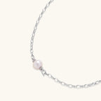 Full length view of Luna Pearl Chain necklace showing chunky rhodium silver link chain and freshwater pearl center by VAHN Jewels
