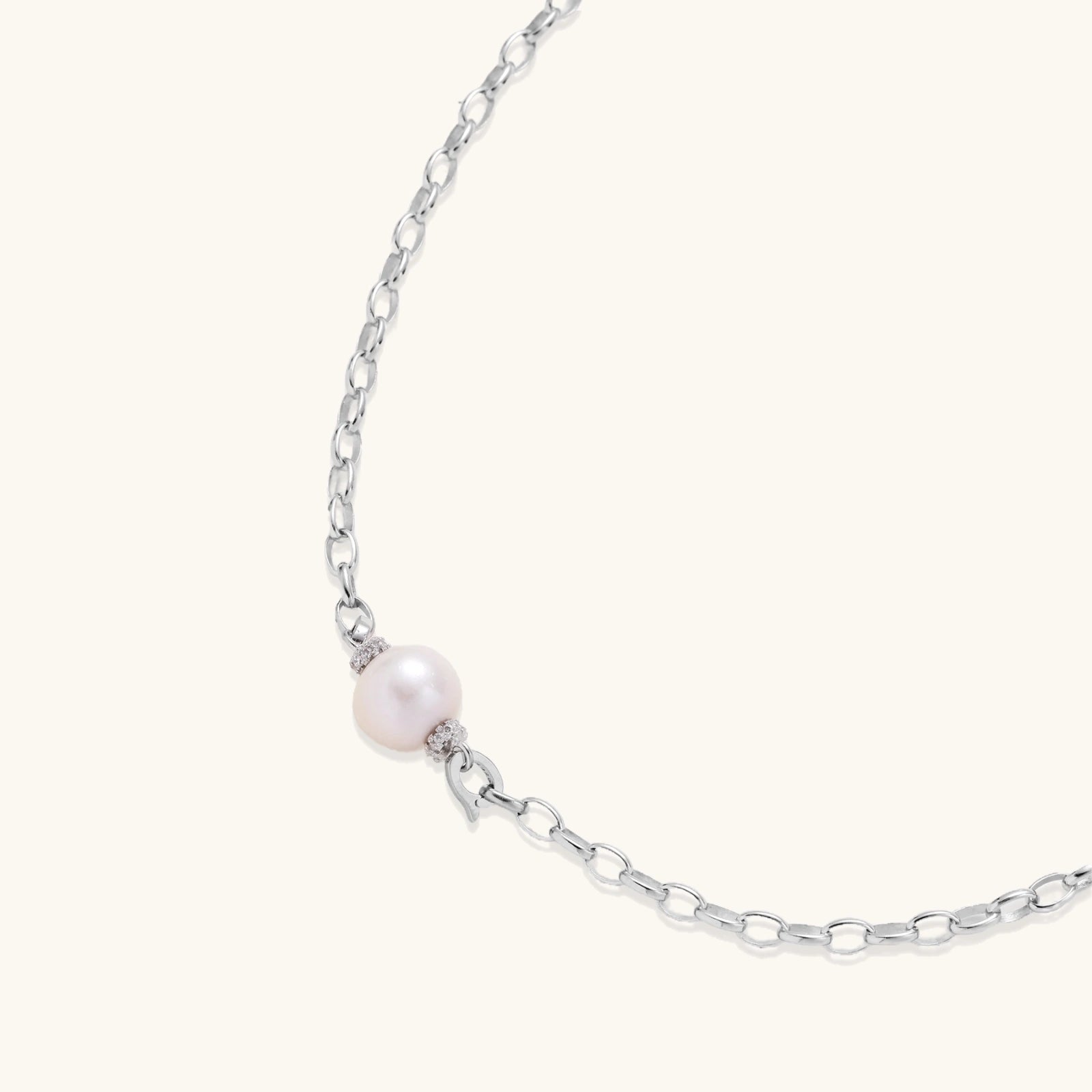 Full length view of Luna Pearl Chain necklace showing chunky rhodium silver link chain and freshwater pearl center by VAHN Jewels