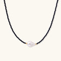 Midnight baroque pearl necklace with blue sandstone beads and 18K gold vermeil accents featuring baroque freshwater pearl center by VAHN Jewels