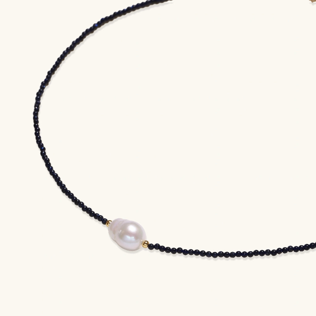 Half circle view of blue sandstone and baroque pearl beaded necklace with gold vermeil accents by VAHN Jewels