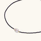 Half circle view of blue sandstone and baroque pearl beaded necklace with gold vermeil accents by VAHN Jewels