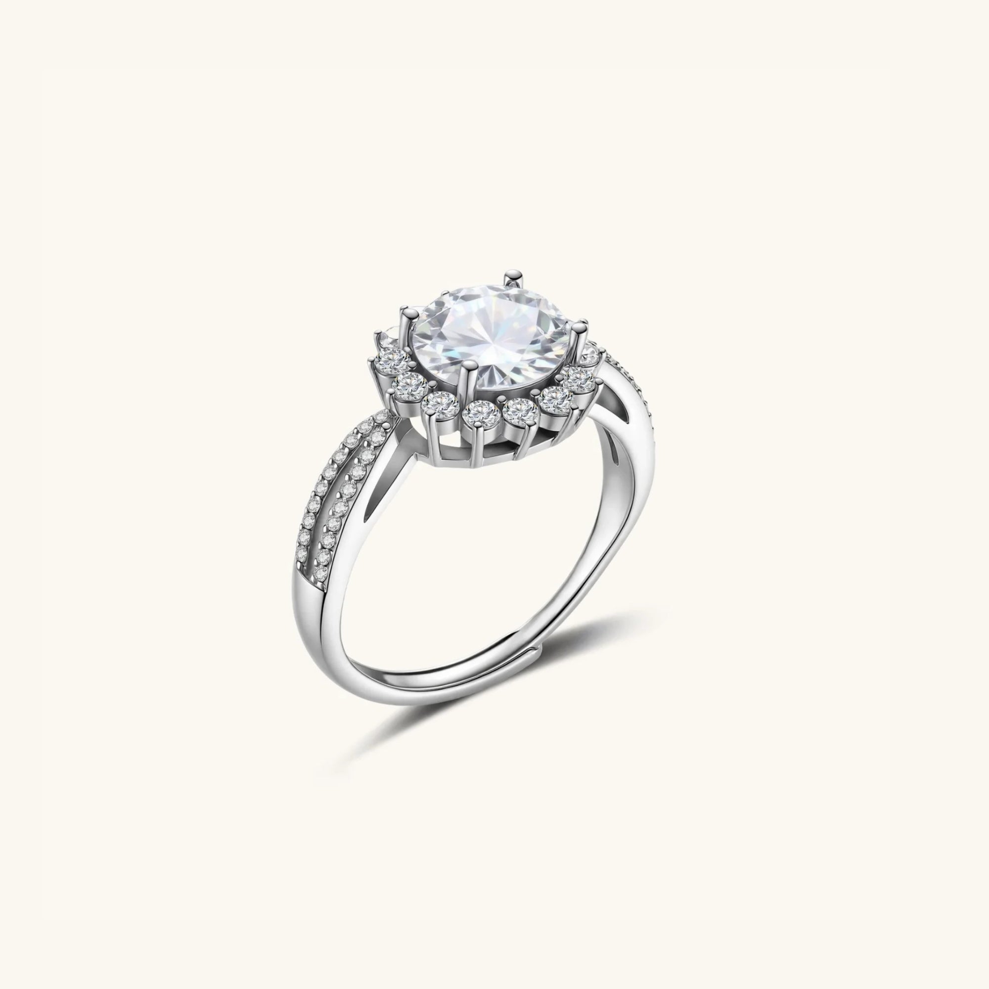 Close-up of moissanite halo ring with pave band in 925 sterling silver