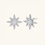 Close-up of eight-point moissanite star studs with pave stones in 925 sterling silver