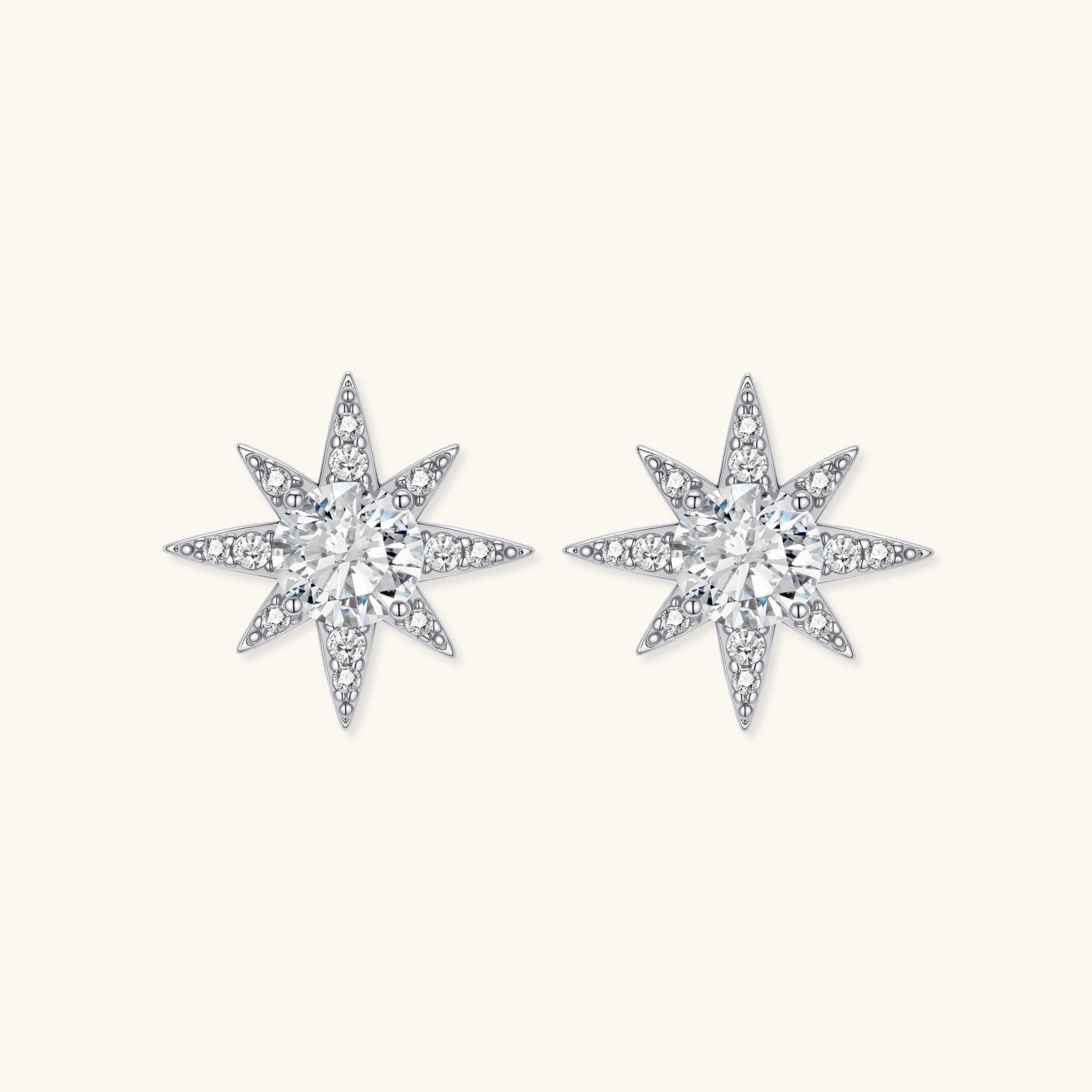 Moissanite star stud earrings in 925 sterling silver with brilliant moissanite center, front view | VAHN Jewels