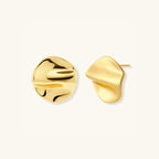Close-up of molten folded gold studs in 18K gold-plated silver