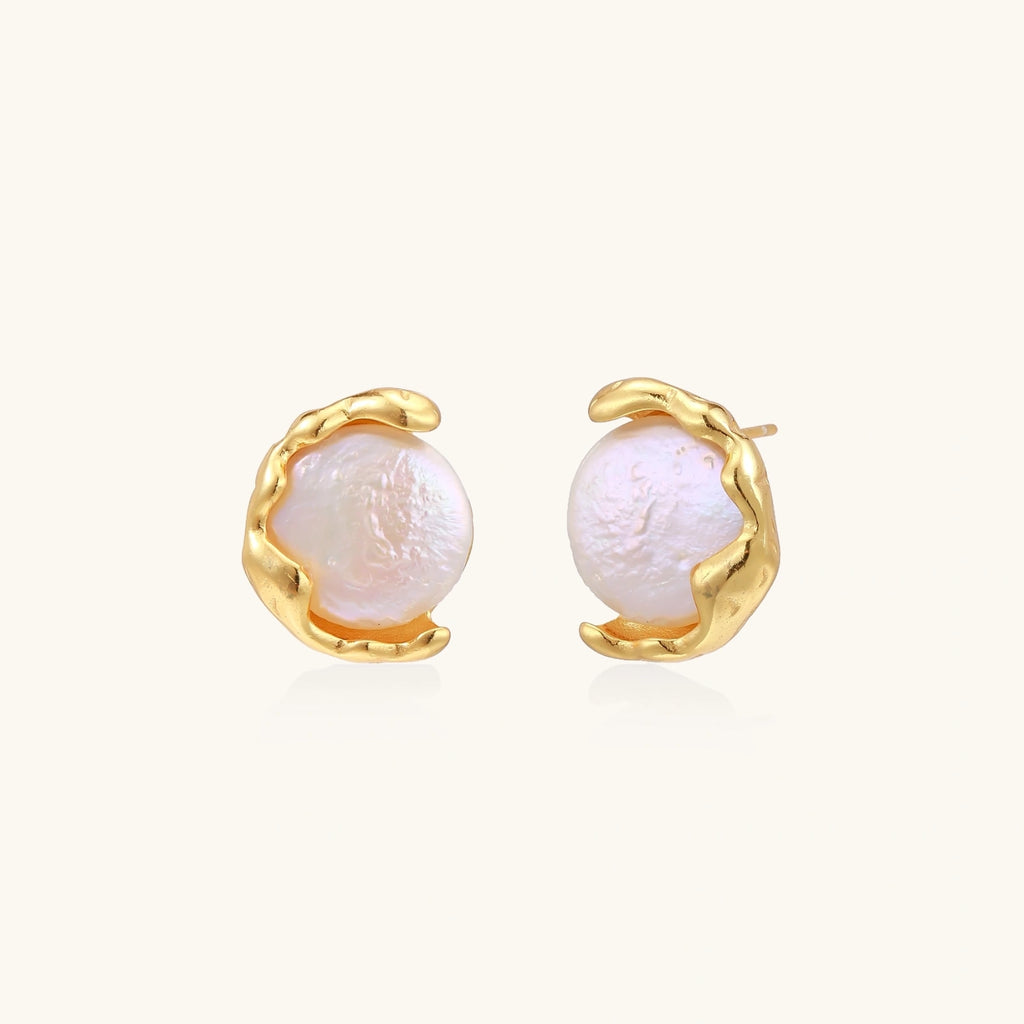 Close-up of freshwater pearl studs in molten gold vermeil setting, 925 sterling silver