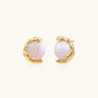 Close-up of freshwater pearl studs in molten gold vermeil setting, 925 sterling silver