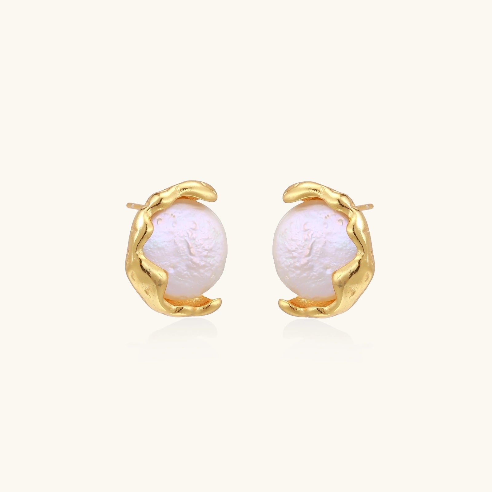 Pair of gold vermeil freshwater pearl stud earrings, organic molten frame