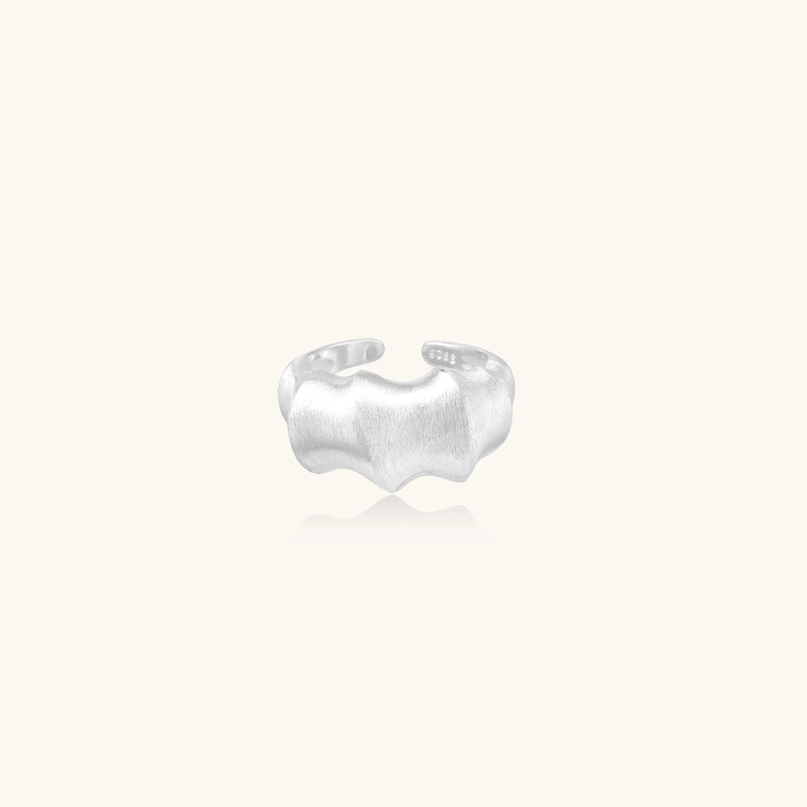 Sculptural molten wave ring in brushed 925 sterling silver, front view | VAHN Jewels