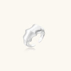 Side view of organic sculptural silver ring in brushed 925 sterling silver