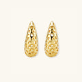 Openwork gold dome hoop earrings in 14K gold-plated 925 sterling silver with intricate lattice cutout design by VAHN Jewels