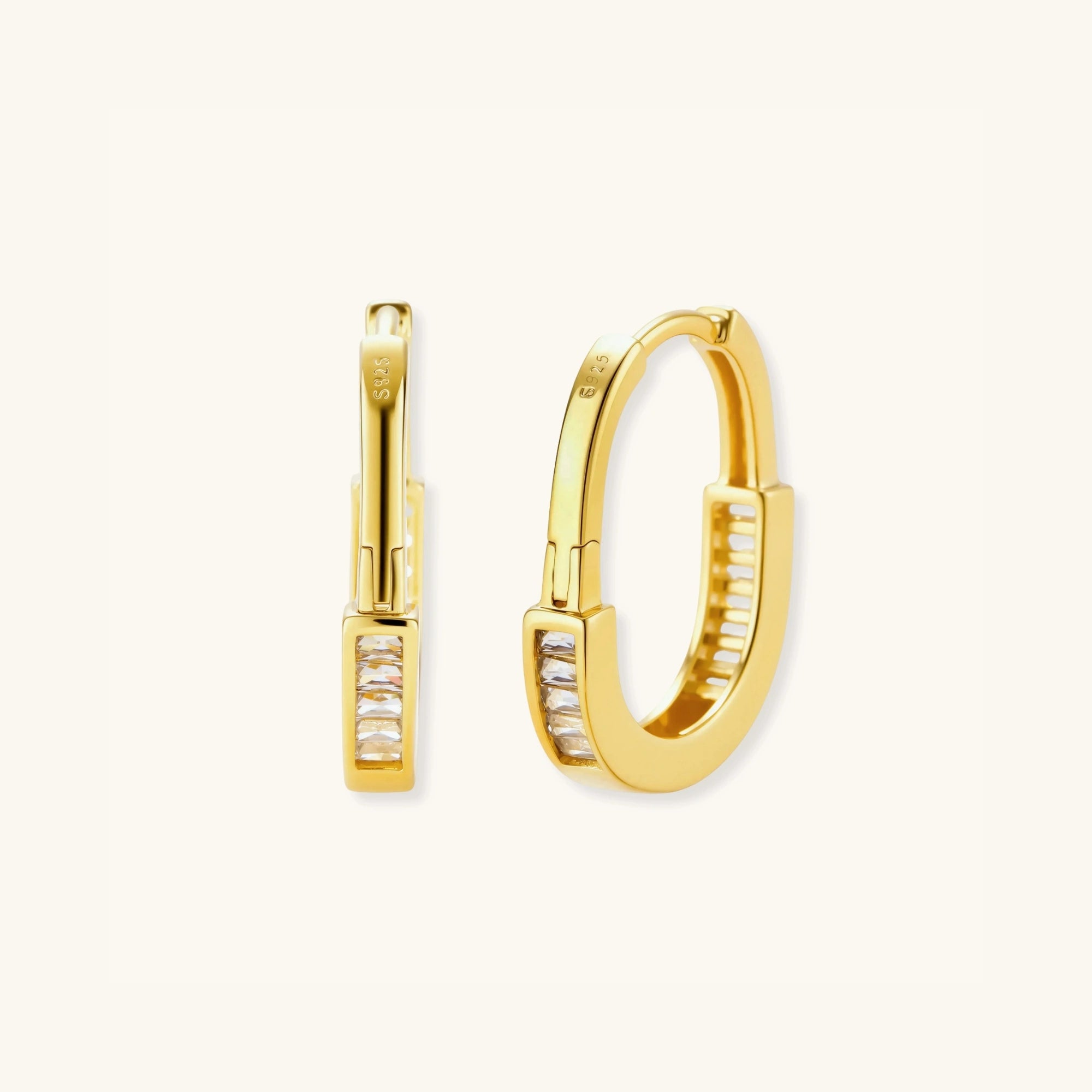 Standing view of pave gold huggie hoop earrings showing zirconia detail in 14K gold-plated 925 silver by VAHN Jewels