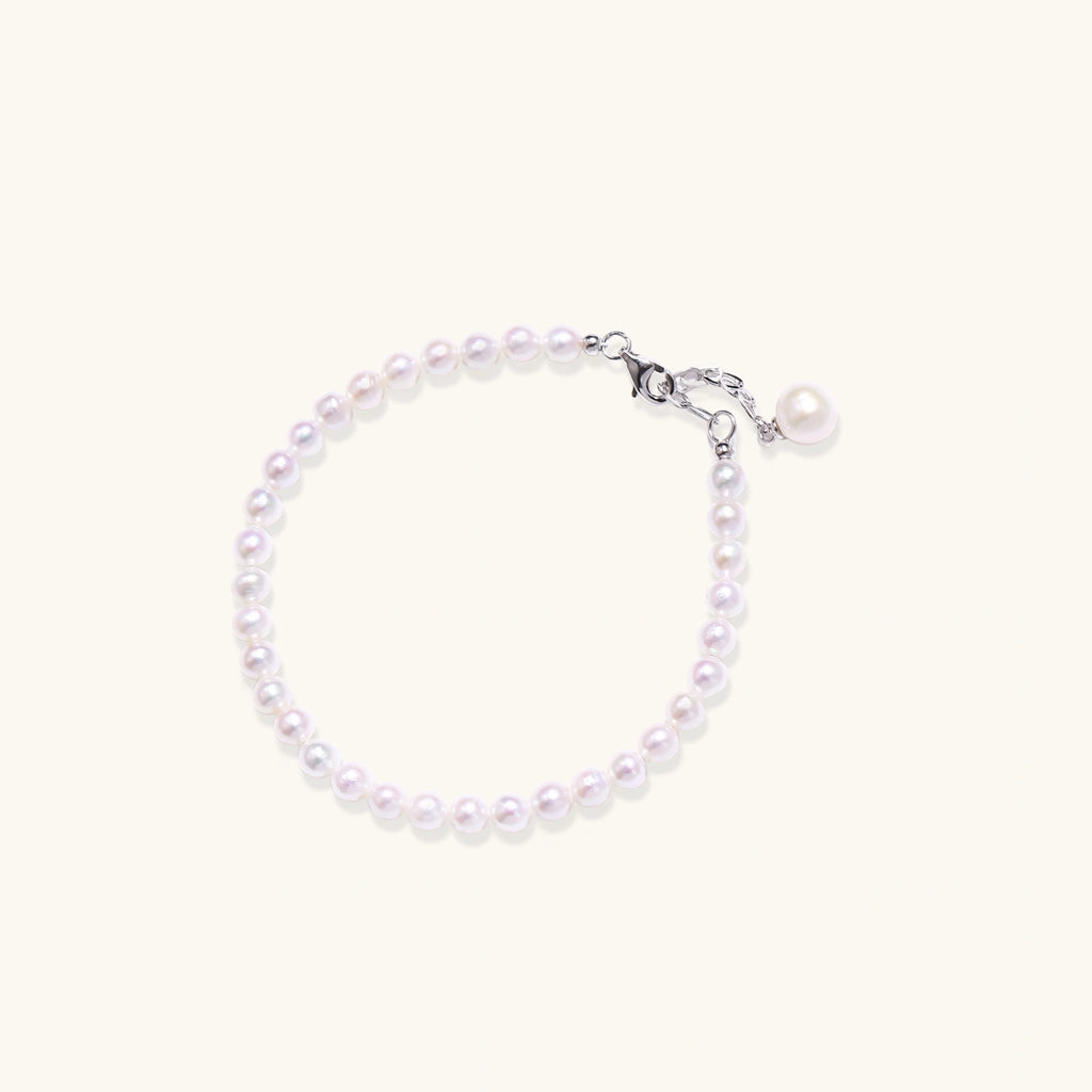 Pearl beaded bracelet with freshwater pearls and pearl charm in rhodium-plated 925 sterling silver, front view | VAHN Jewels