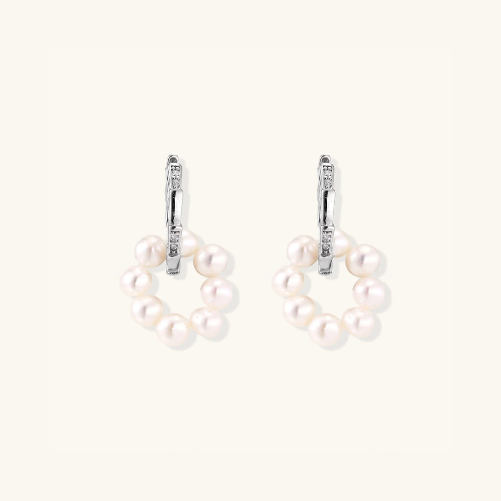 Pearl cluster huggie hoop earrings with freshwater pearls in rhodium-plated 925 sterling silver, front view | VAHN Jewels