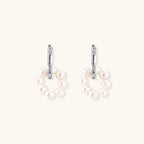 Pearl cluster huggie hoop earrings with freshwater pearls in rhodium-plated 925 sterling silver, front view | VAHN Jewels