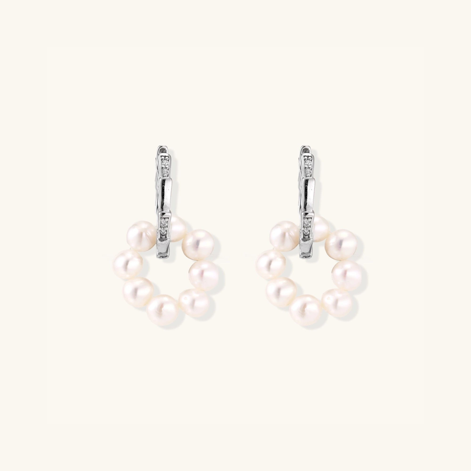 Pearl cluster huggie hoop earrings with freshwater pearls in rhodium-plated 925 sterling silver, front view | VAHN Jewels