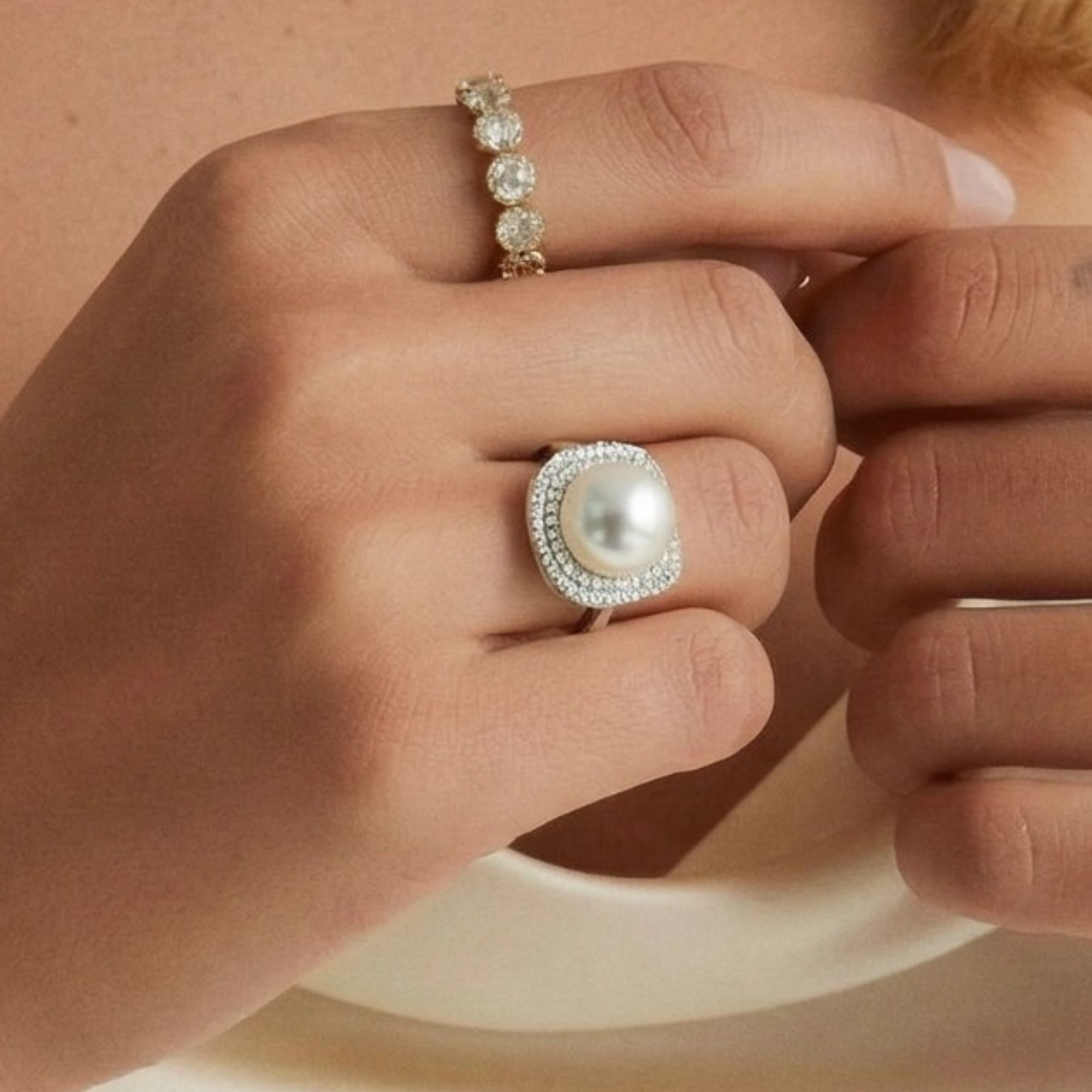 Woman wearing pearl halo cocktail ring in silver | VAHN Jewels