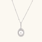 Pearl halo pendant necklace in rhodium-plated 925 sterling silver with 9.2mm freshwater pearl and pave zirconia halo by VAHN Jewels