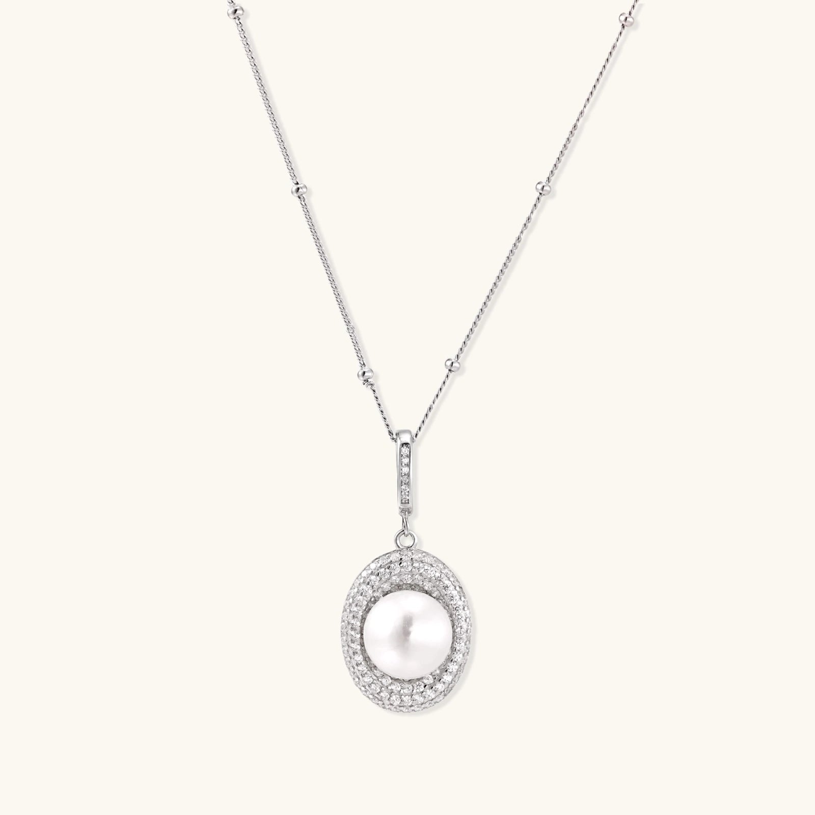 Pearl halo pendant necklace in rhodium-plated 925 sterling silver with 9.2mm freshwater pearl and pave zirconia halo by VAHN Jewels