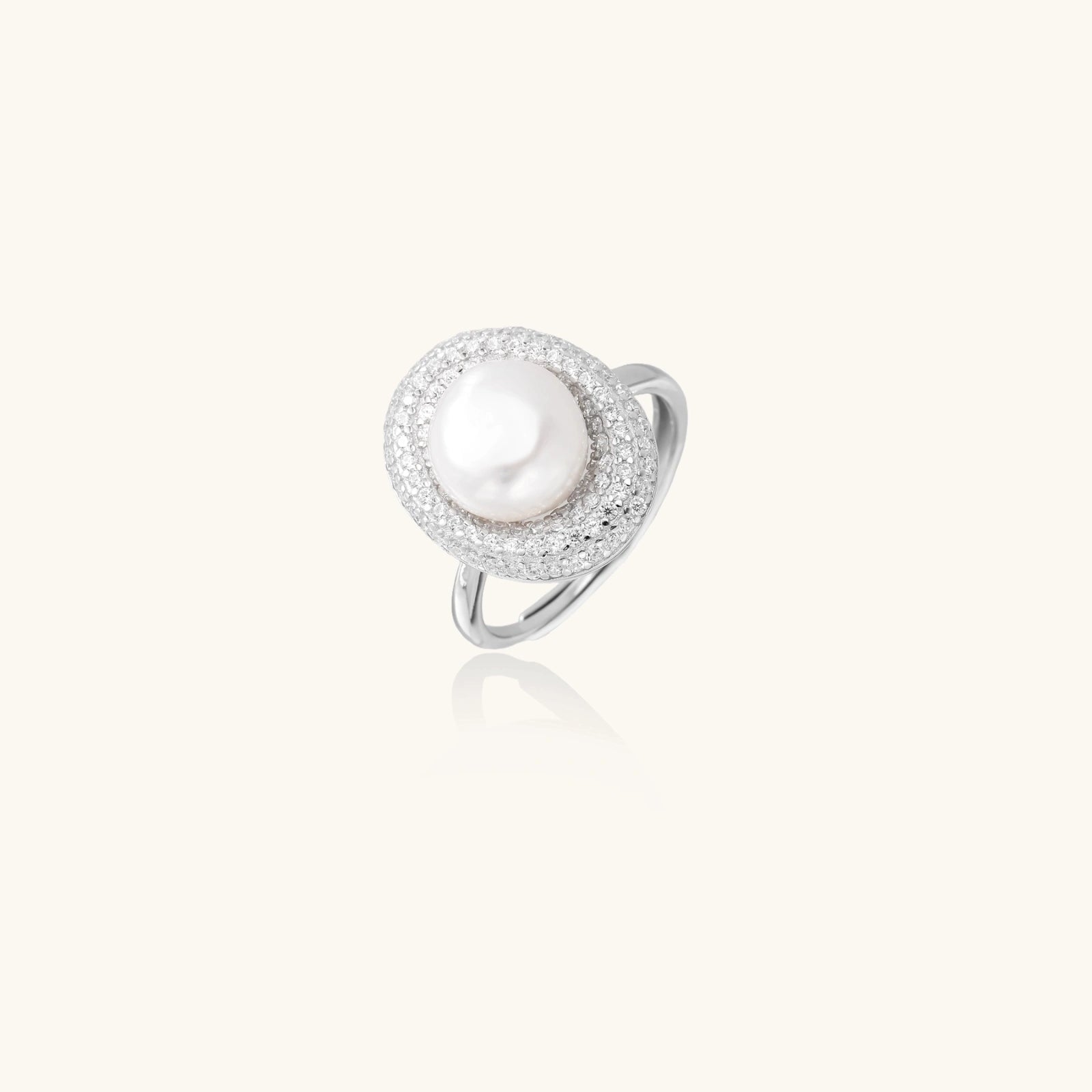 Side view of freshwater pearl ring with pave crystal halo in rhodium-plated silver