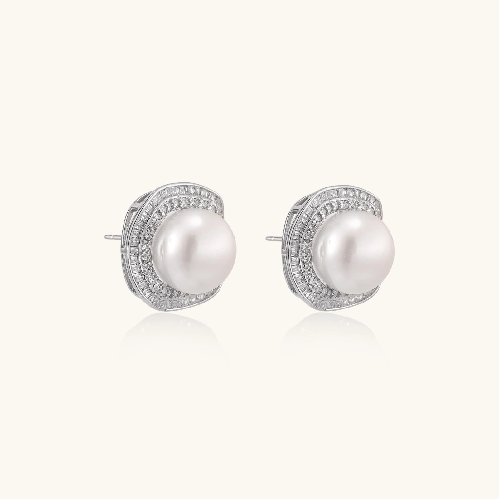 Angled view of pearl halo stud earrings showing cushion square halo and pearl depth by VAHN Jewels
