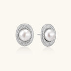 Close-up of freshwater pearl halo studs with pave crystal in rhodium-plated silver