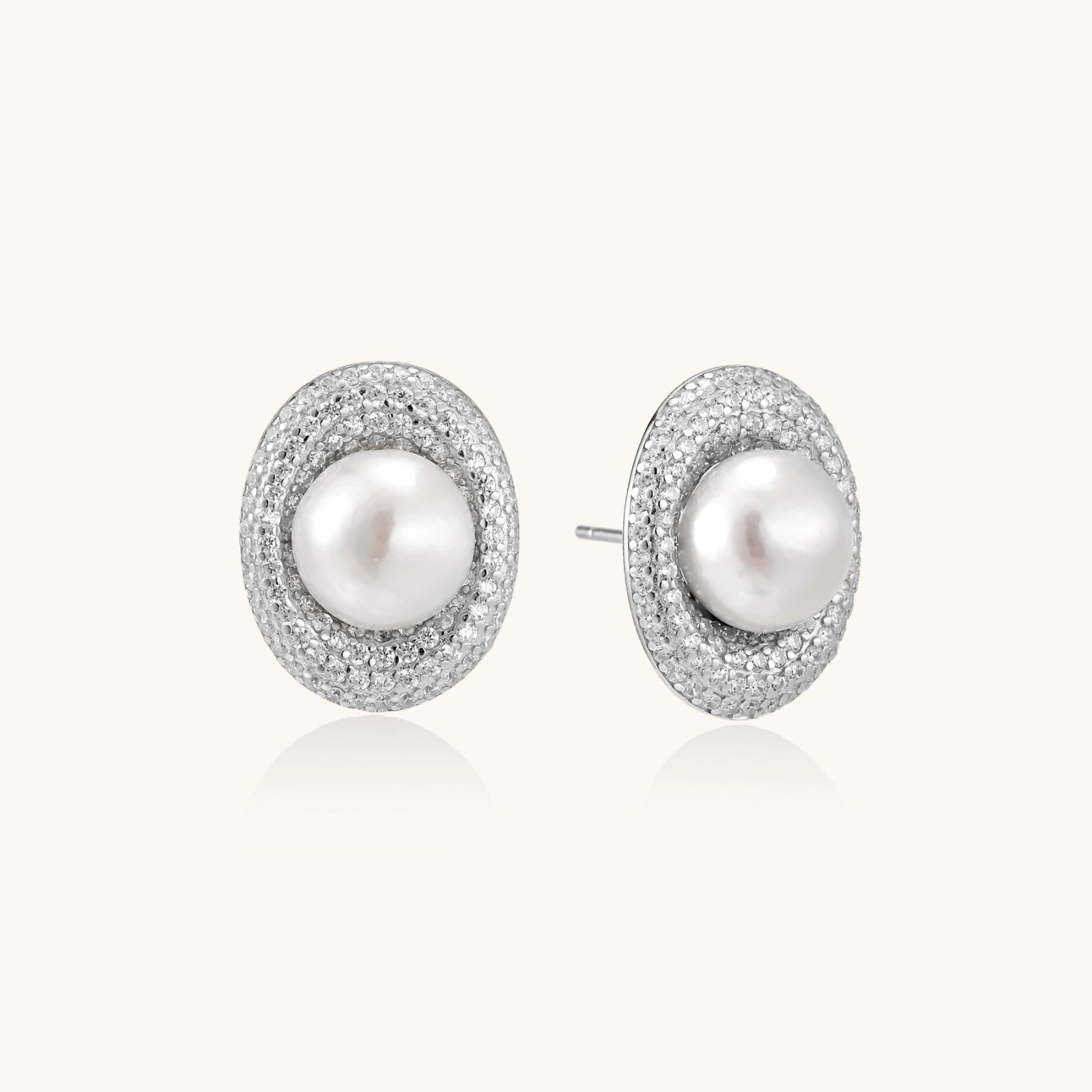 Close-up of freshwater pearl halo studs with pave crystal in rhodium-plated silver