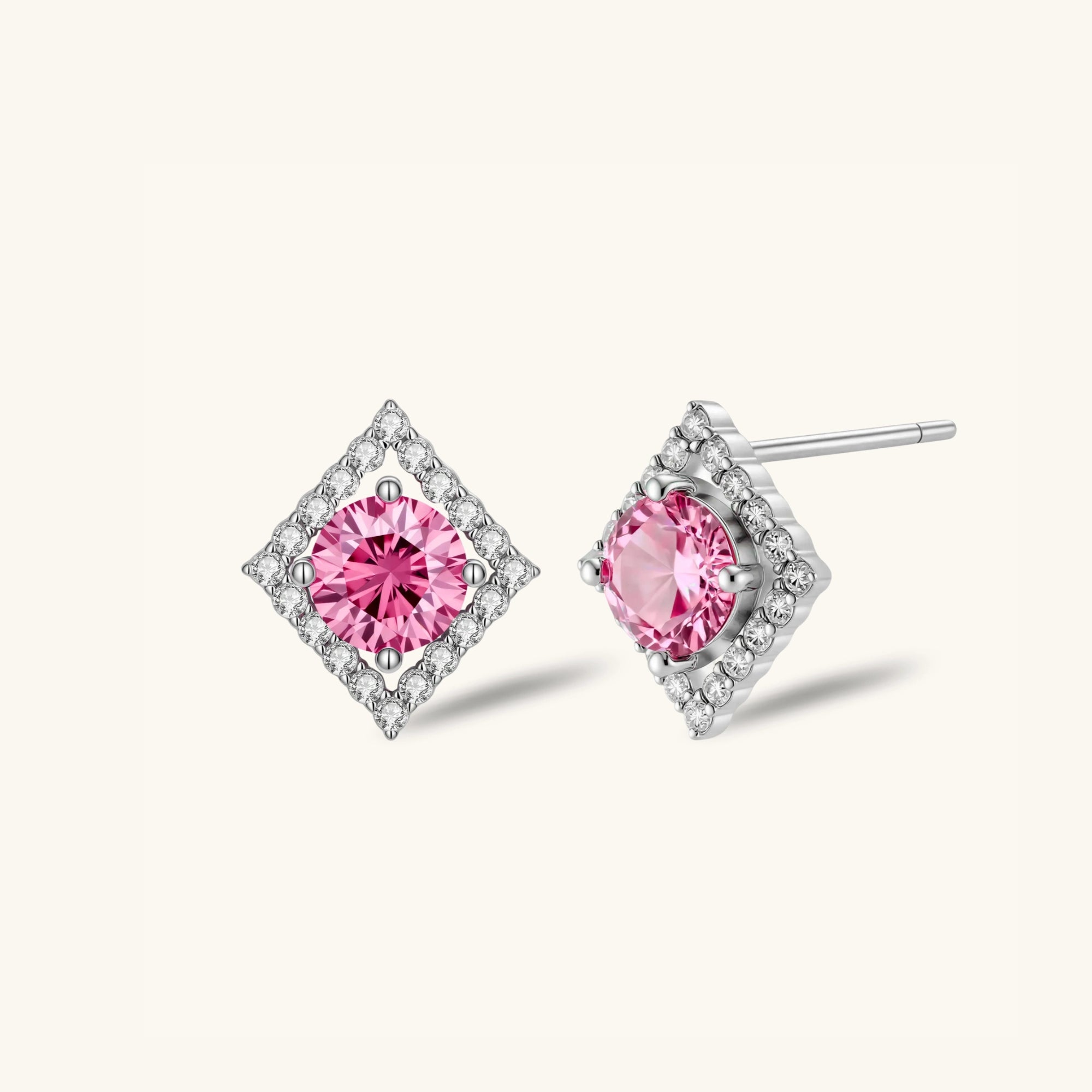 Close-up of pink moissanite center with pave halo in 925 sterling silver studs